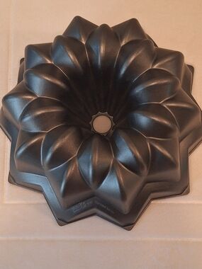 Nordic Ware Star Bundt Pan In Dark Gray. Sturdy Cast Aliminum Nonstick Coating.